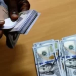 Naira weakens to 920 per US dollar, while fuel marketers advocate for a new increase in prices.