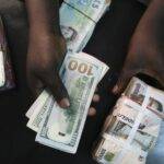 “The Naira reaches an unprecedented low of N980 due to increasing demand for dollars.”