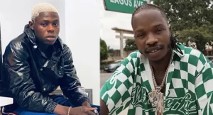 Read more about the article “Naira Marley detained while Lagos police investigate Mobhad’s demise.”